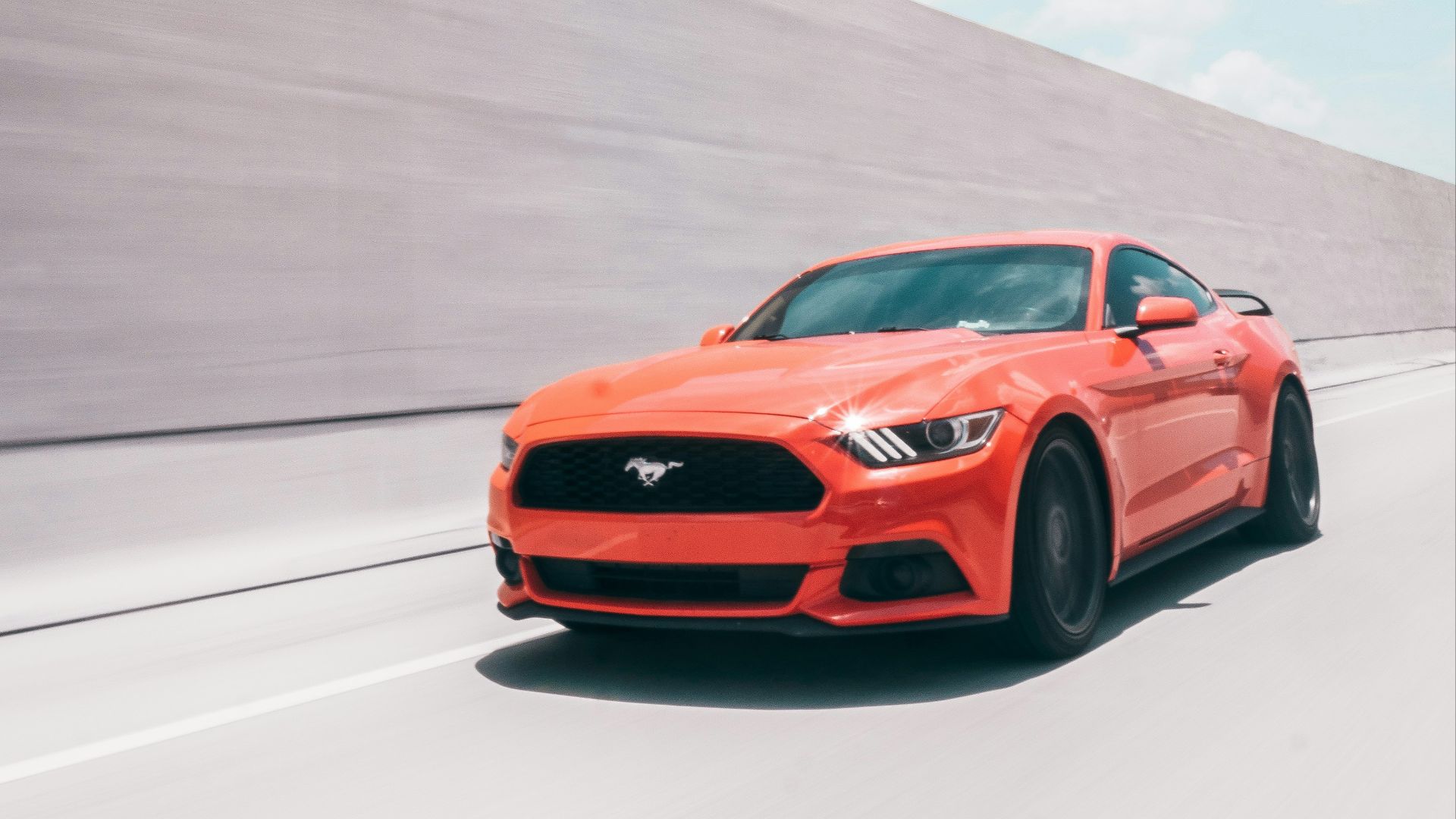 red ferrari 458 italia on gray asphalt road
