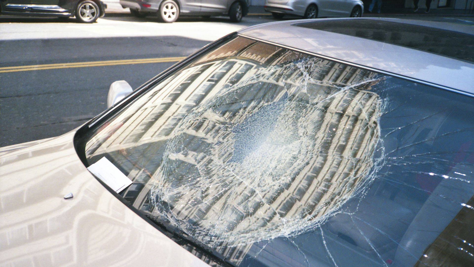 blue car with white snow on top