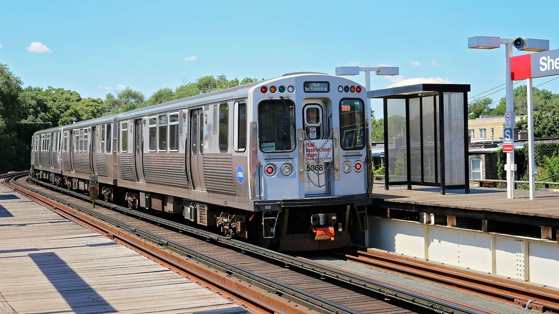 silver train near station