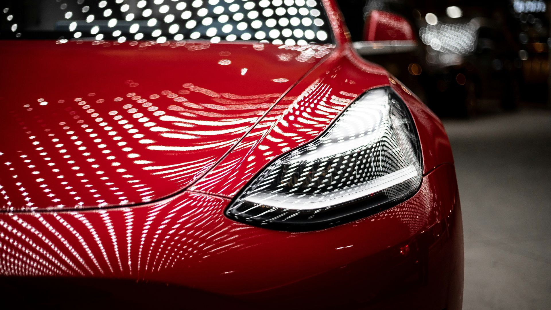 close-up photography of red car