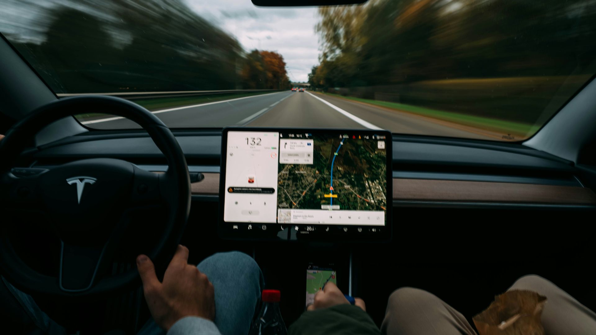 2 person sitting on car seat