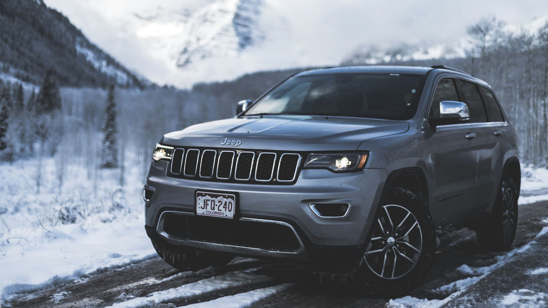 gray Jeep SUV parked on road