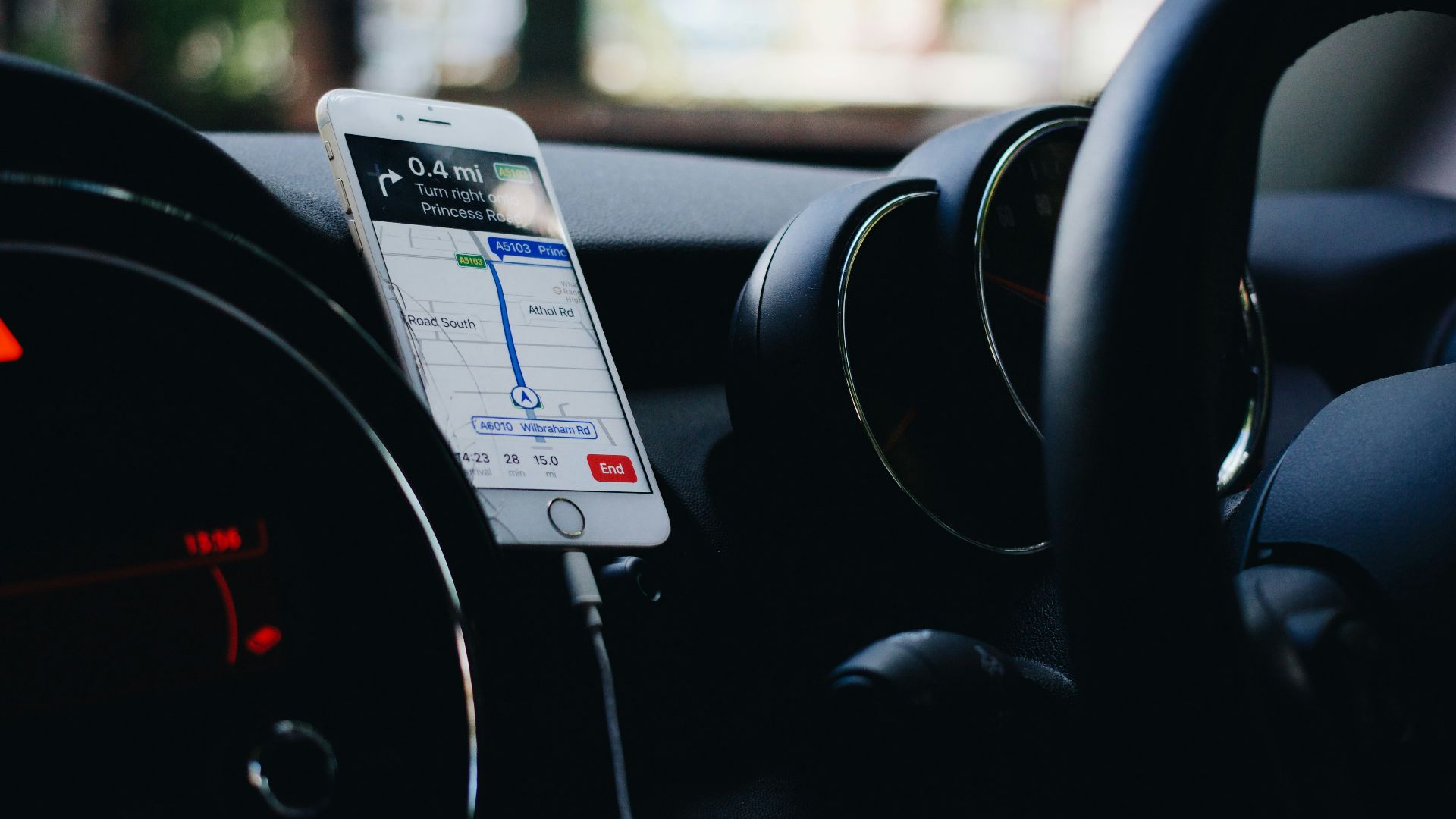 iPhone on vehicle phone holder