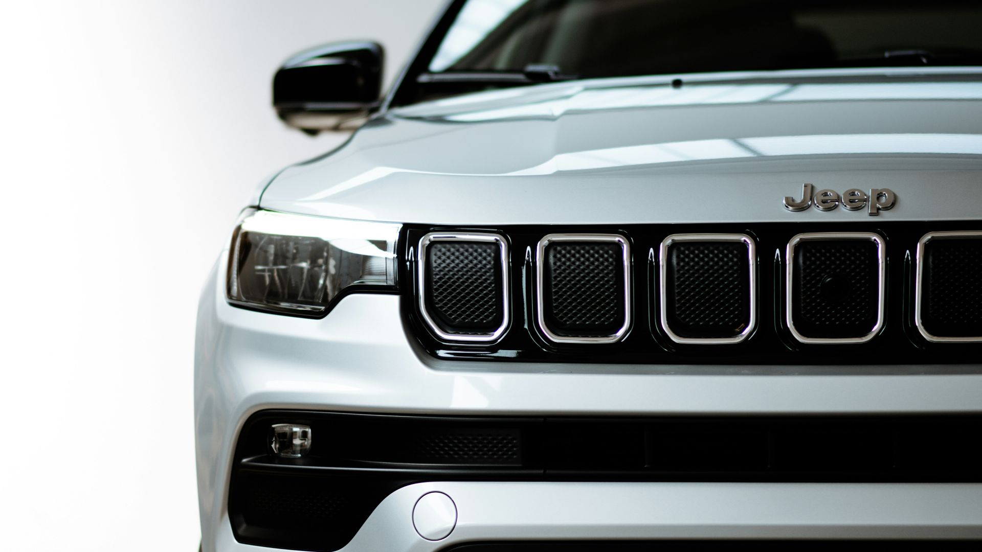 white and black car in close up photography