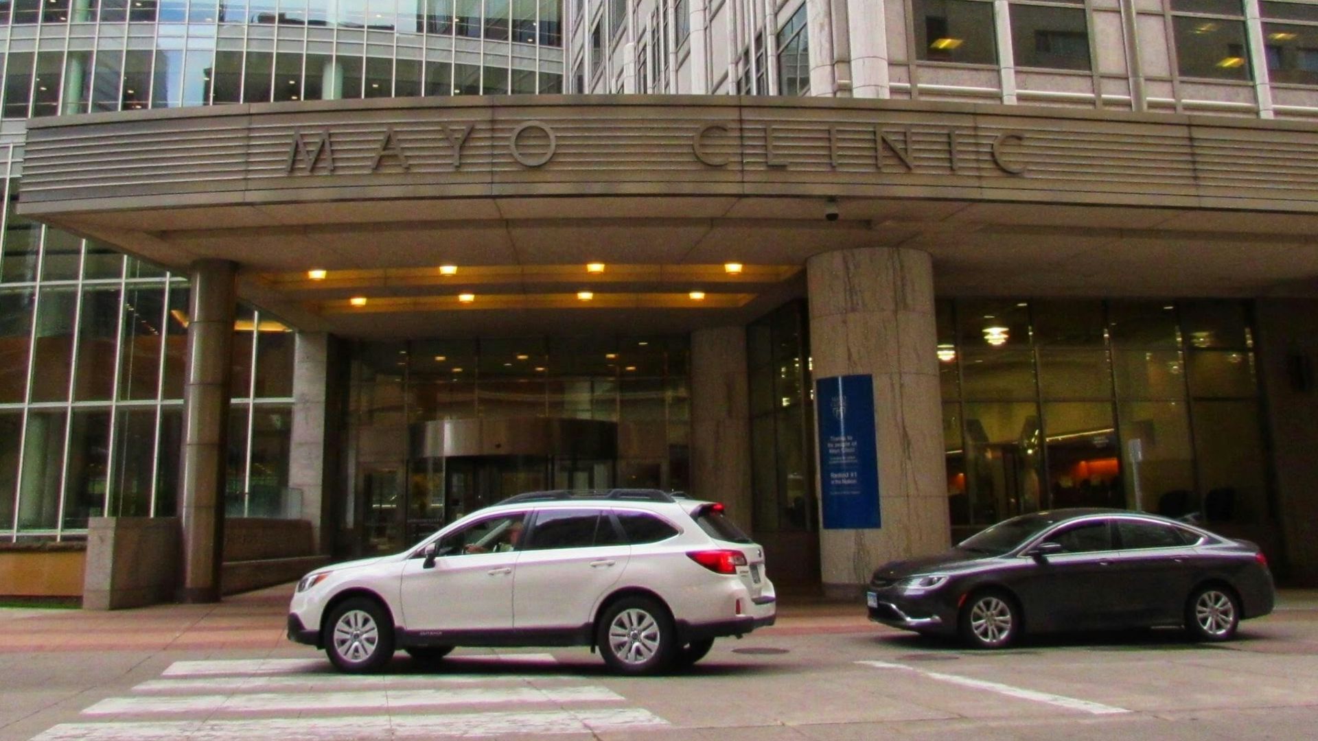 cars parked in front of building