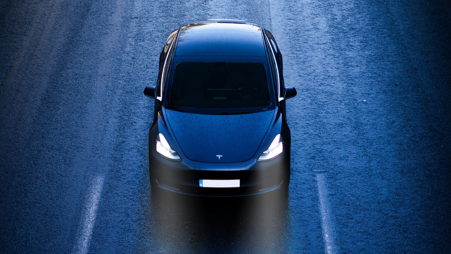 blue car on road during daytime