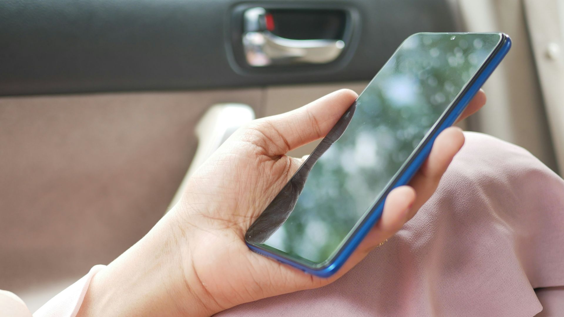 person holding black android smartphone