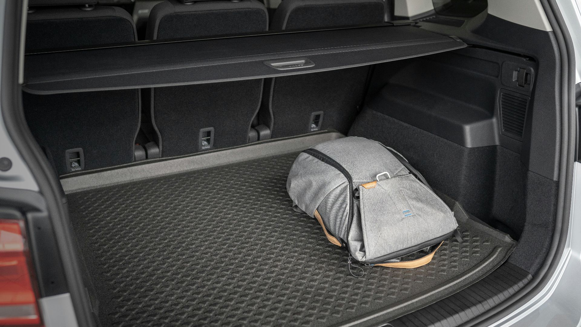 gray and yellow bag on car seat