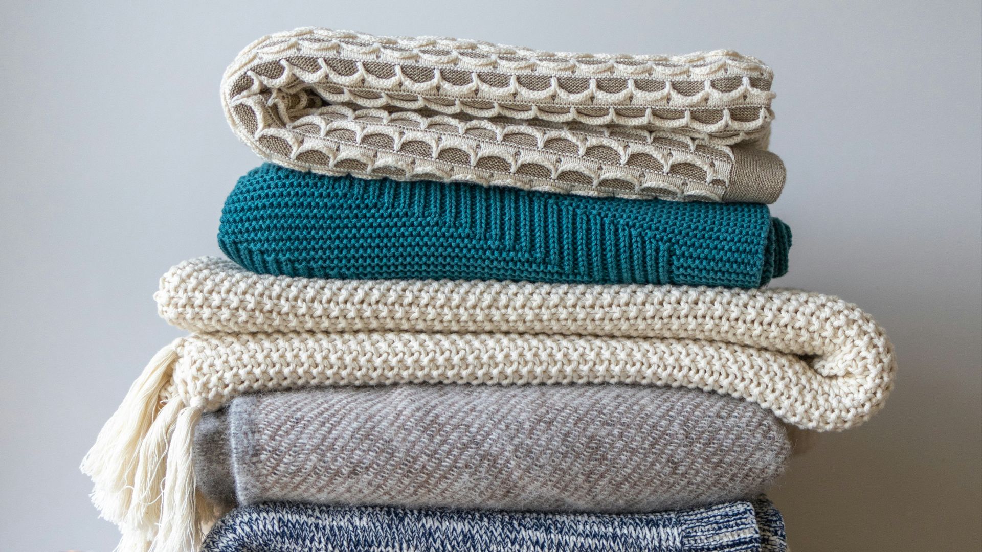 white and blue knit textile