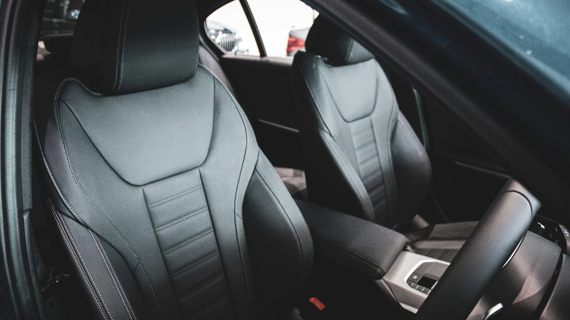 black leather car seat in car