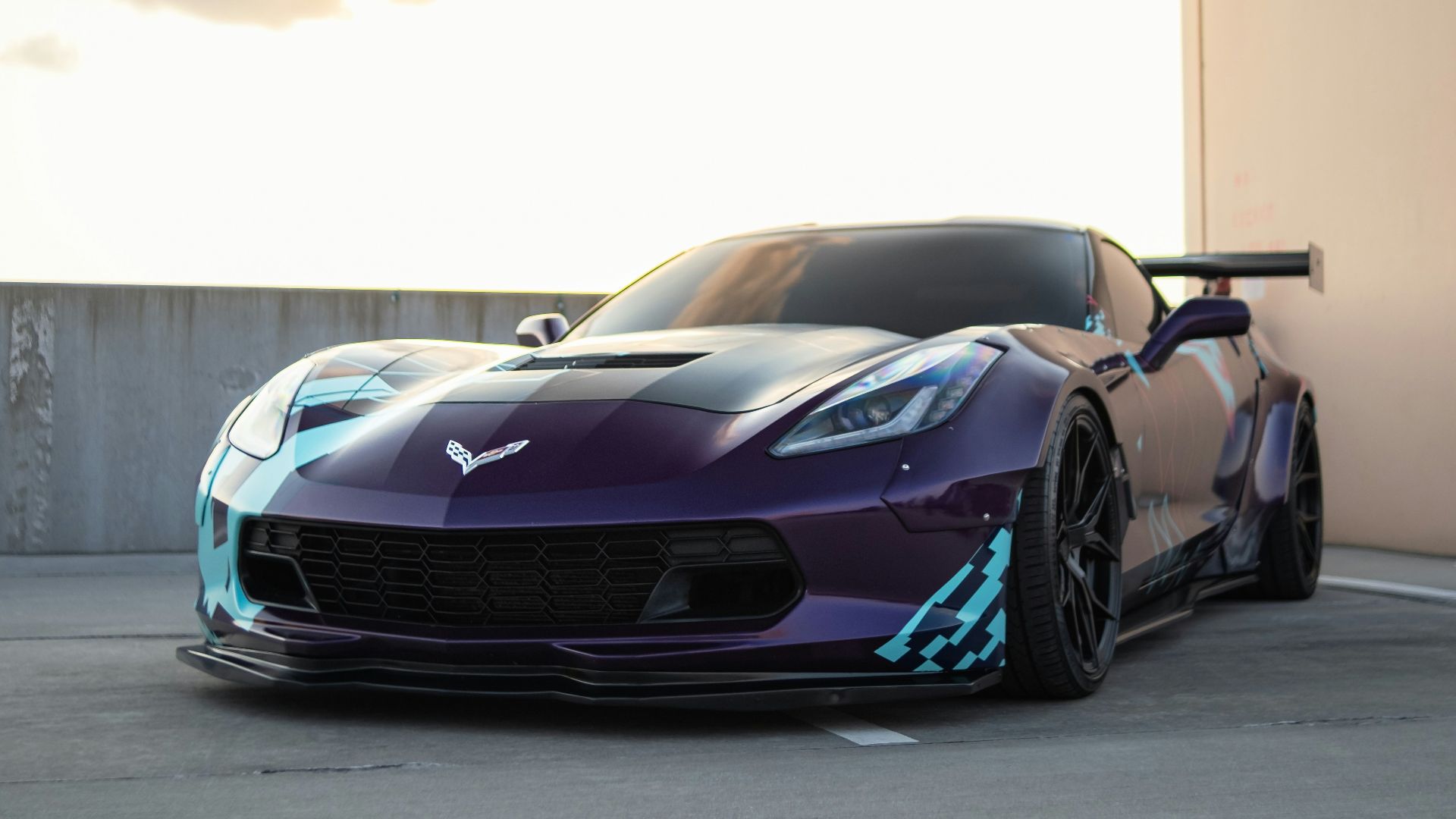 blue and black porsche 911 on road