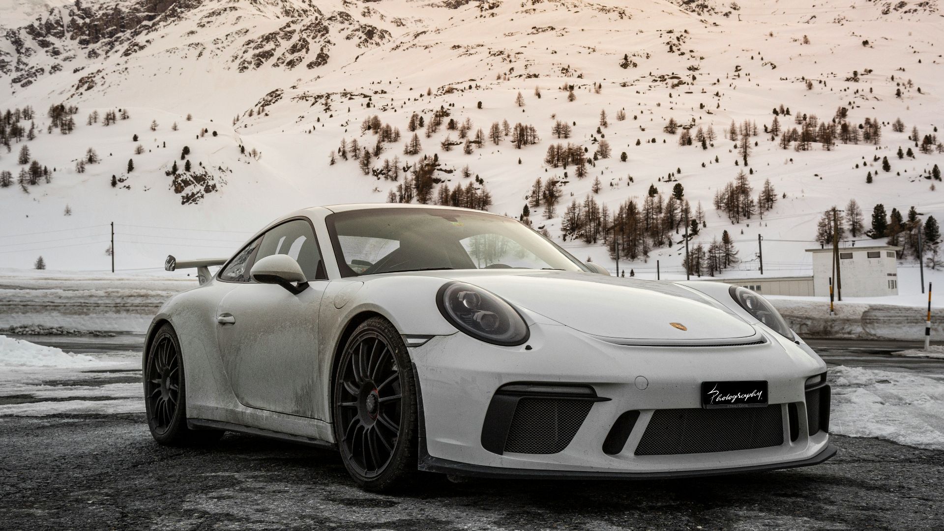 silver porsche 911 on road during daytime