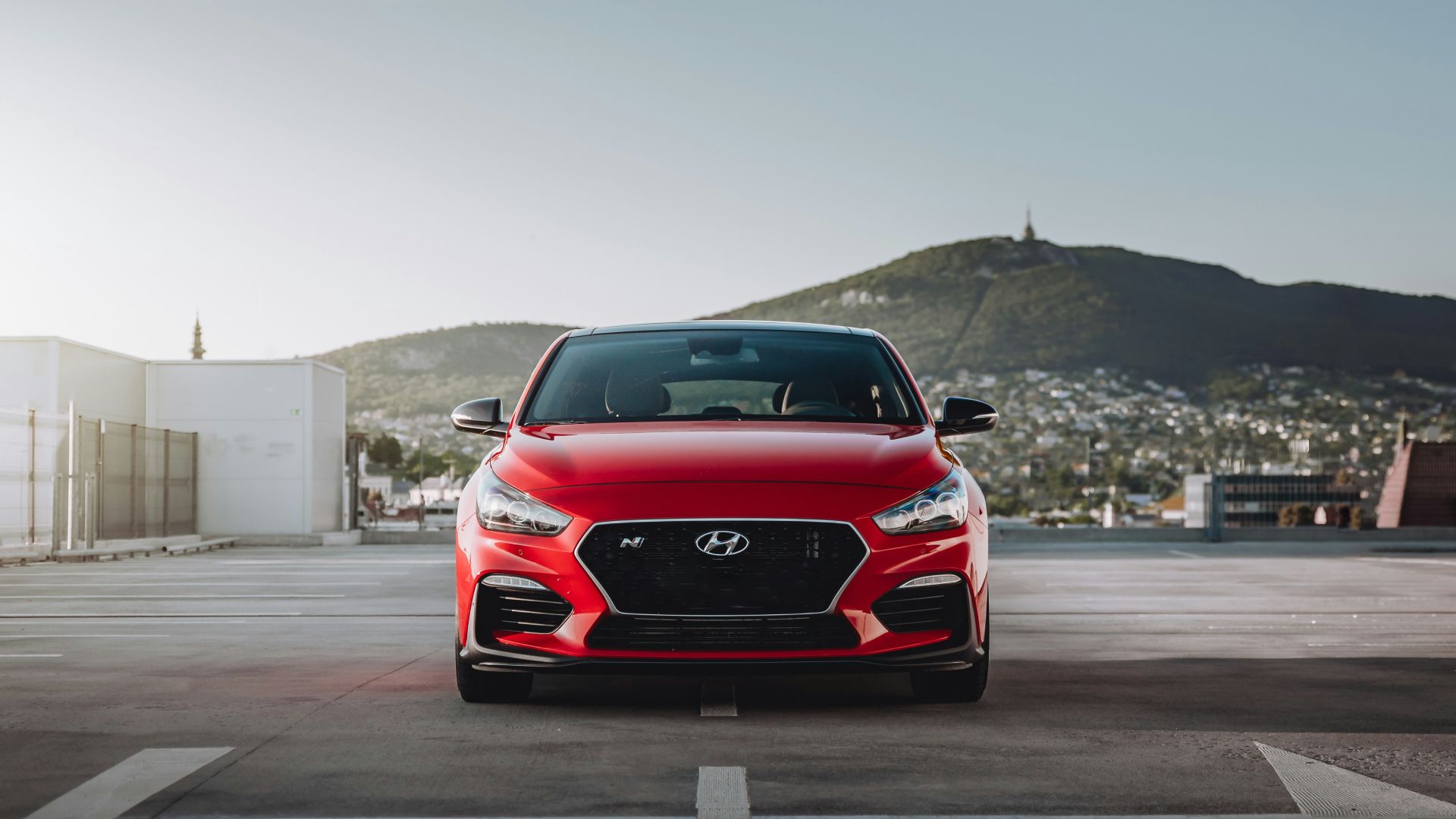 red bmw m 3 on road during daytime