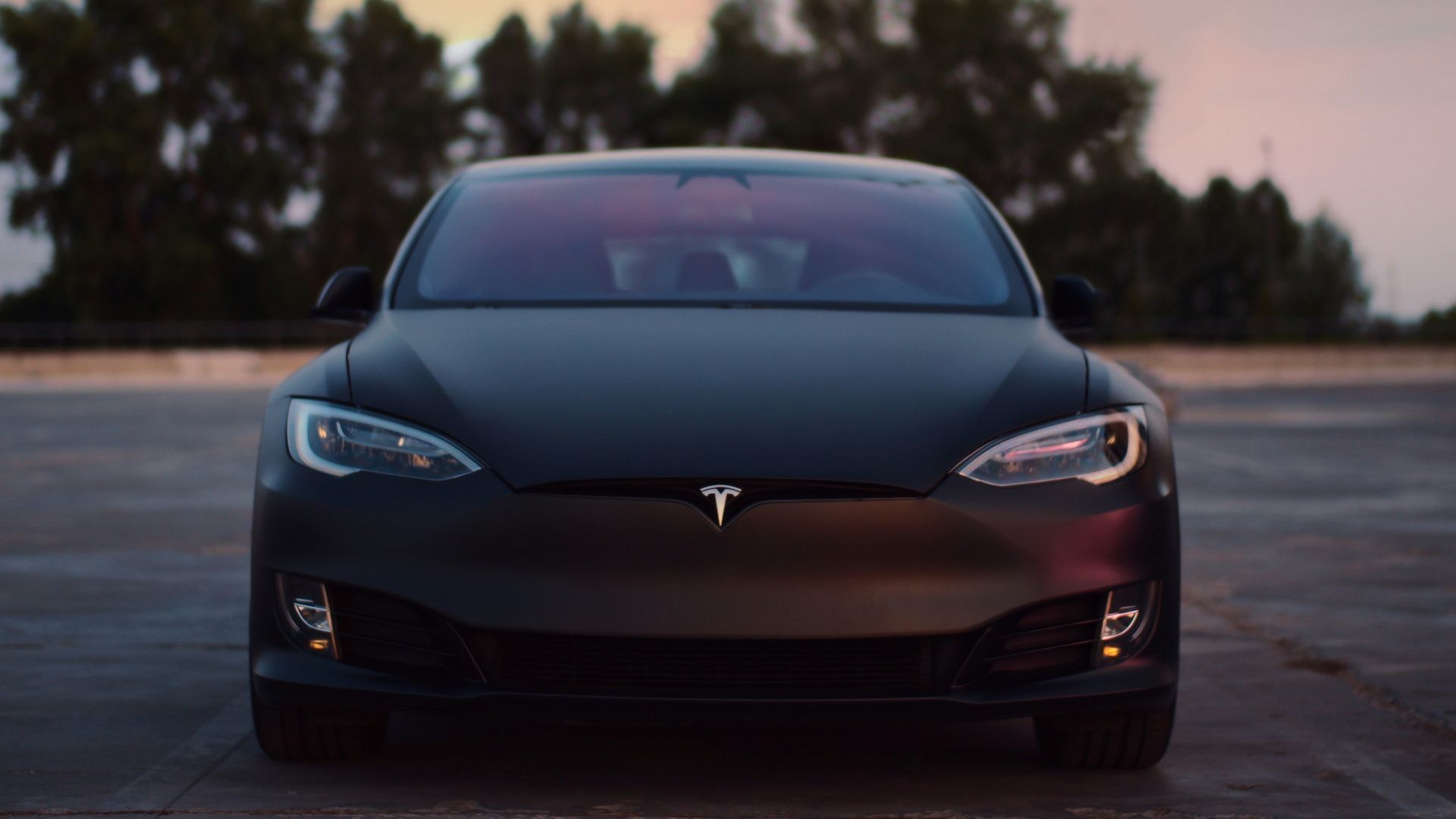 black porsche 911 on road during sunset