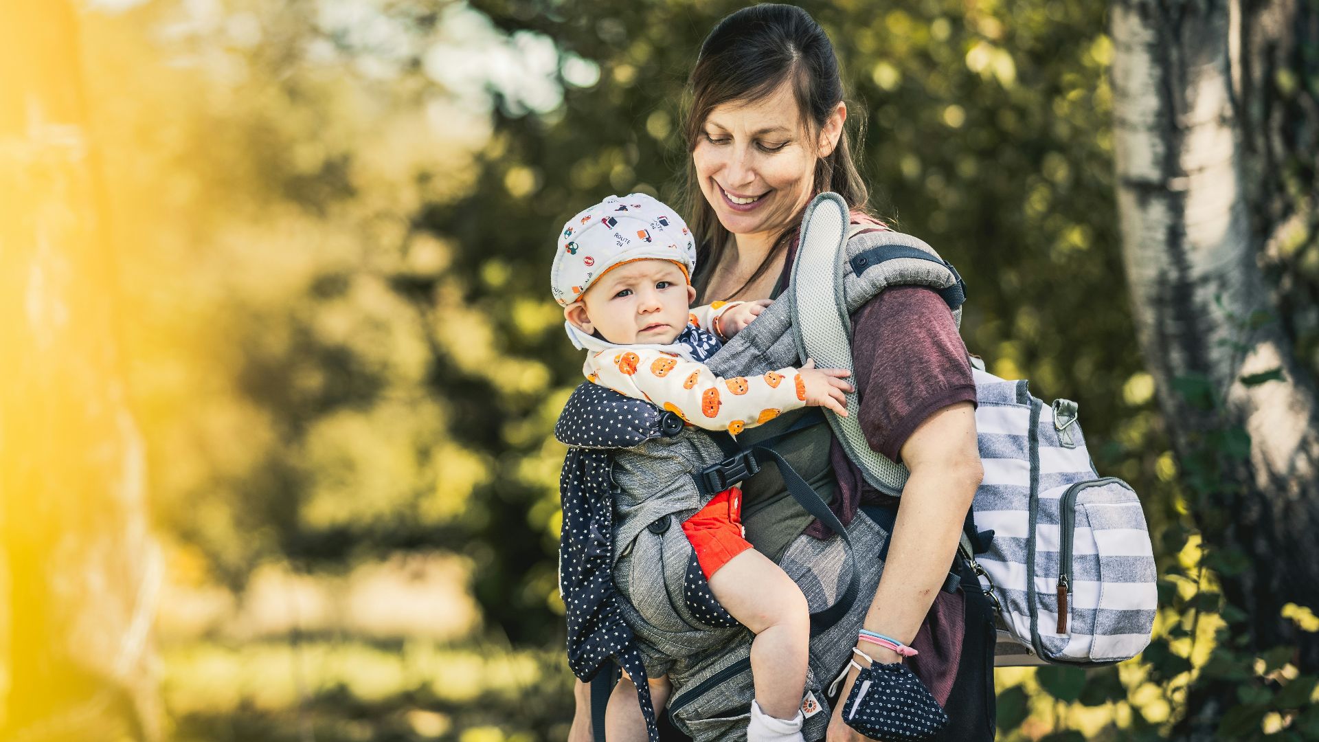 a woman holding a child in her arms