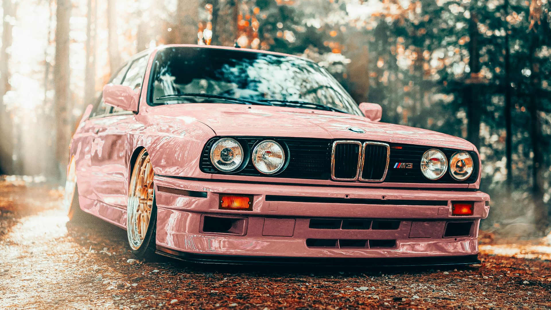 red bmw m 3 on road during daytime