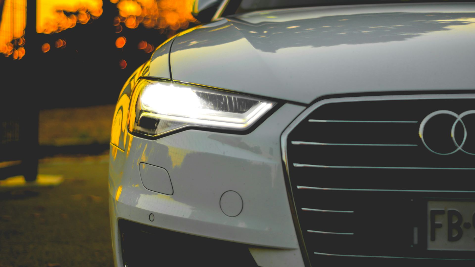 close shot of white Audi car