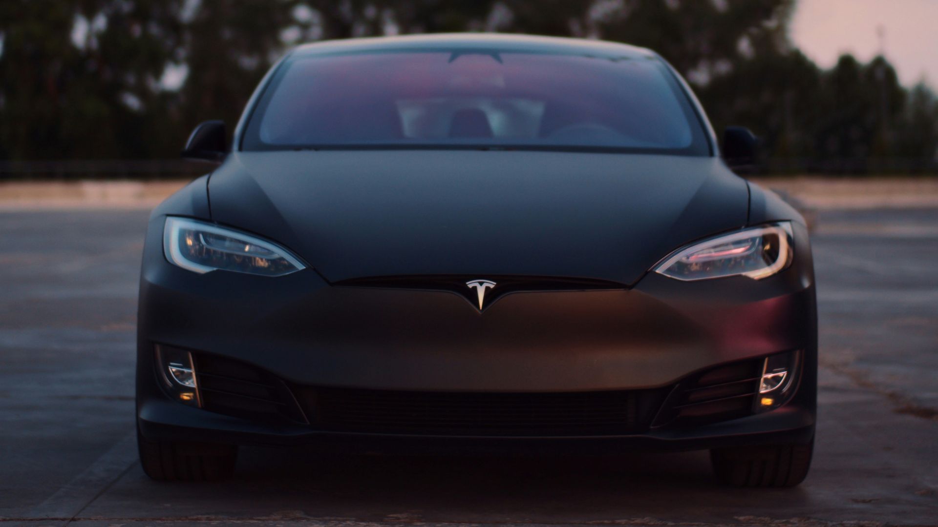 black porsche 911 on road during sunset