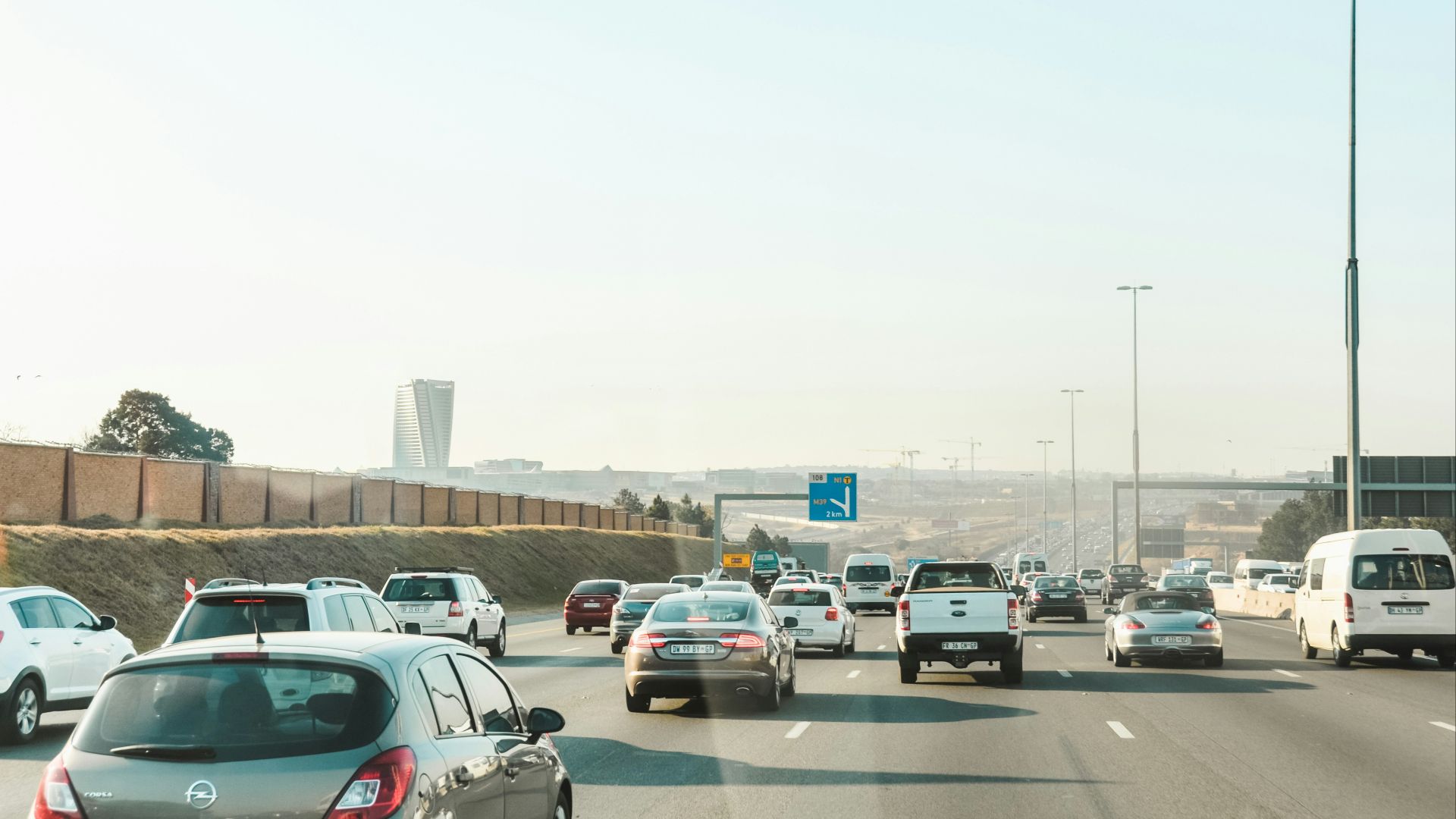 cars parked on parking lot during daytime