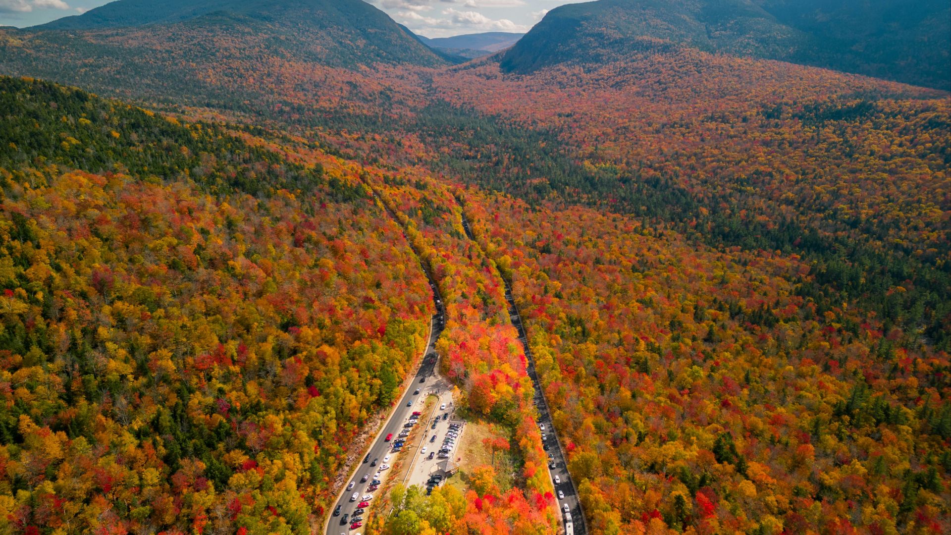 a winding road through a beautiful landscape