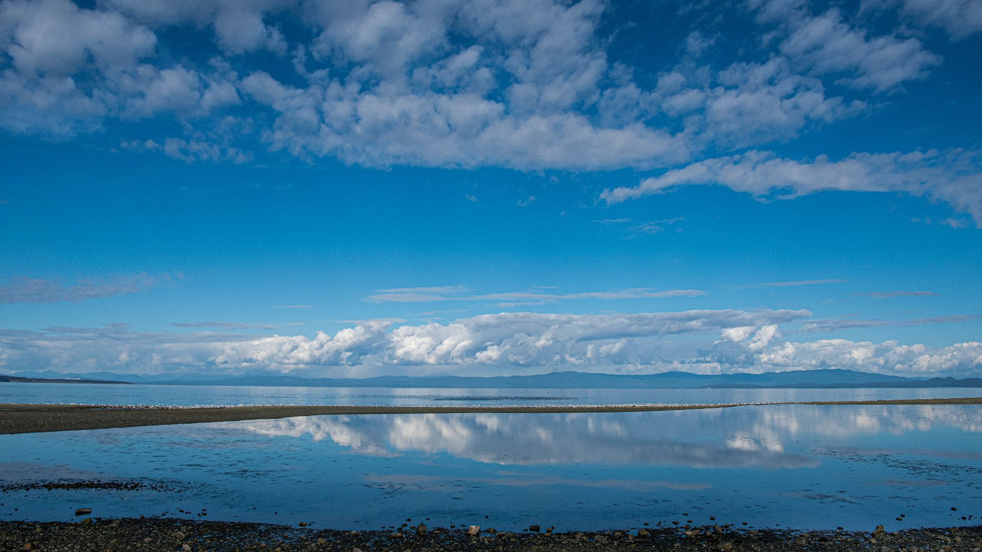 a large body of water surrounded by rocks