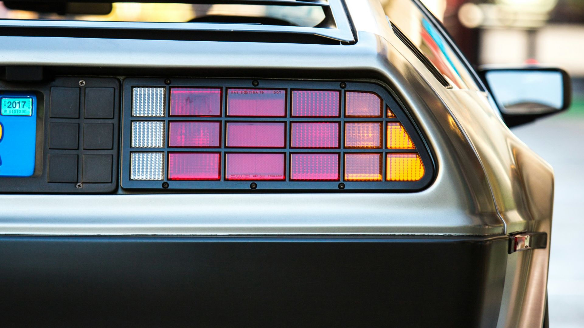 selective focus photography of silver car