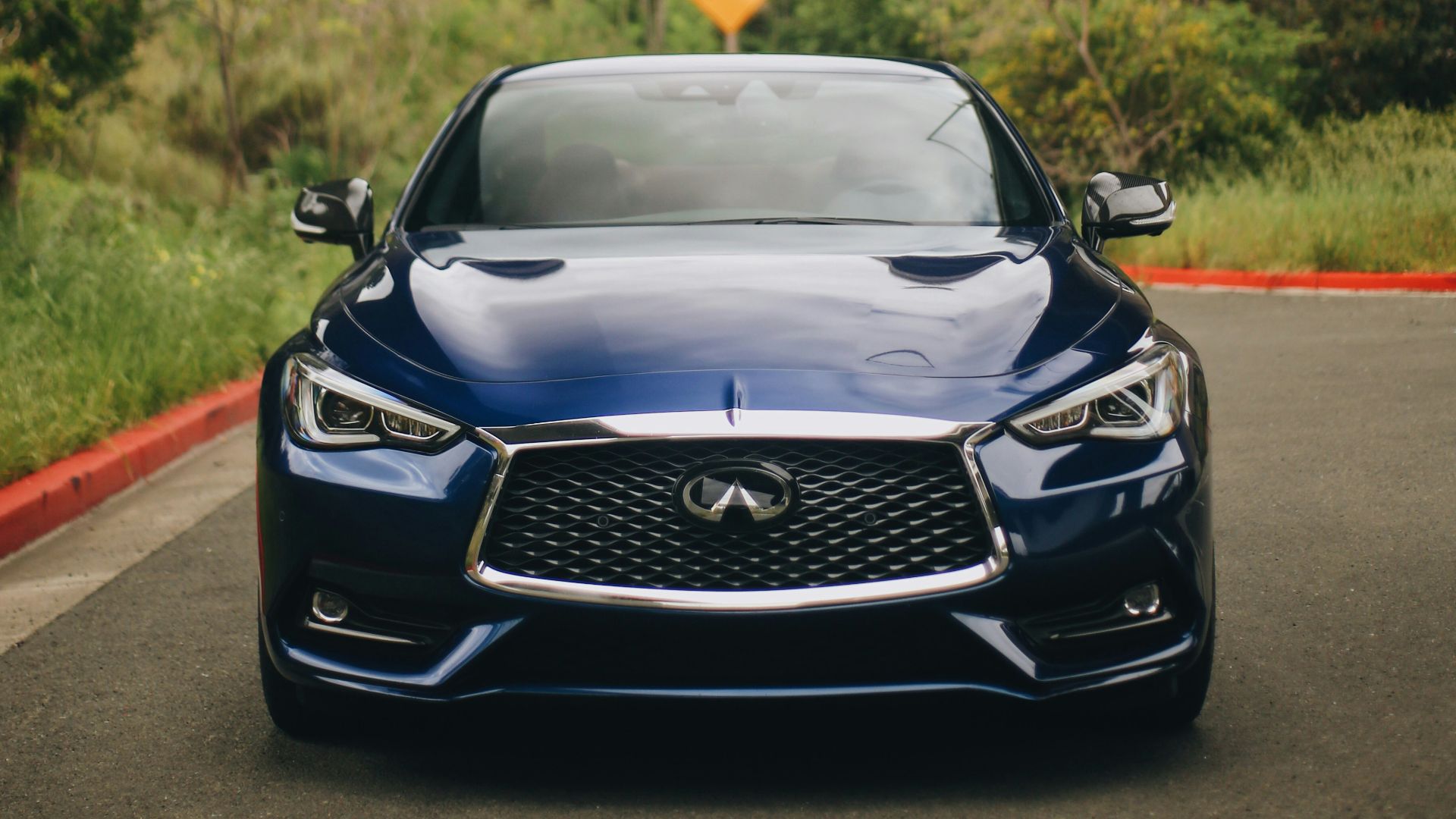 black bmw m 3 parked on gray asphalt road during daytime