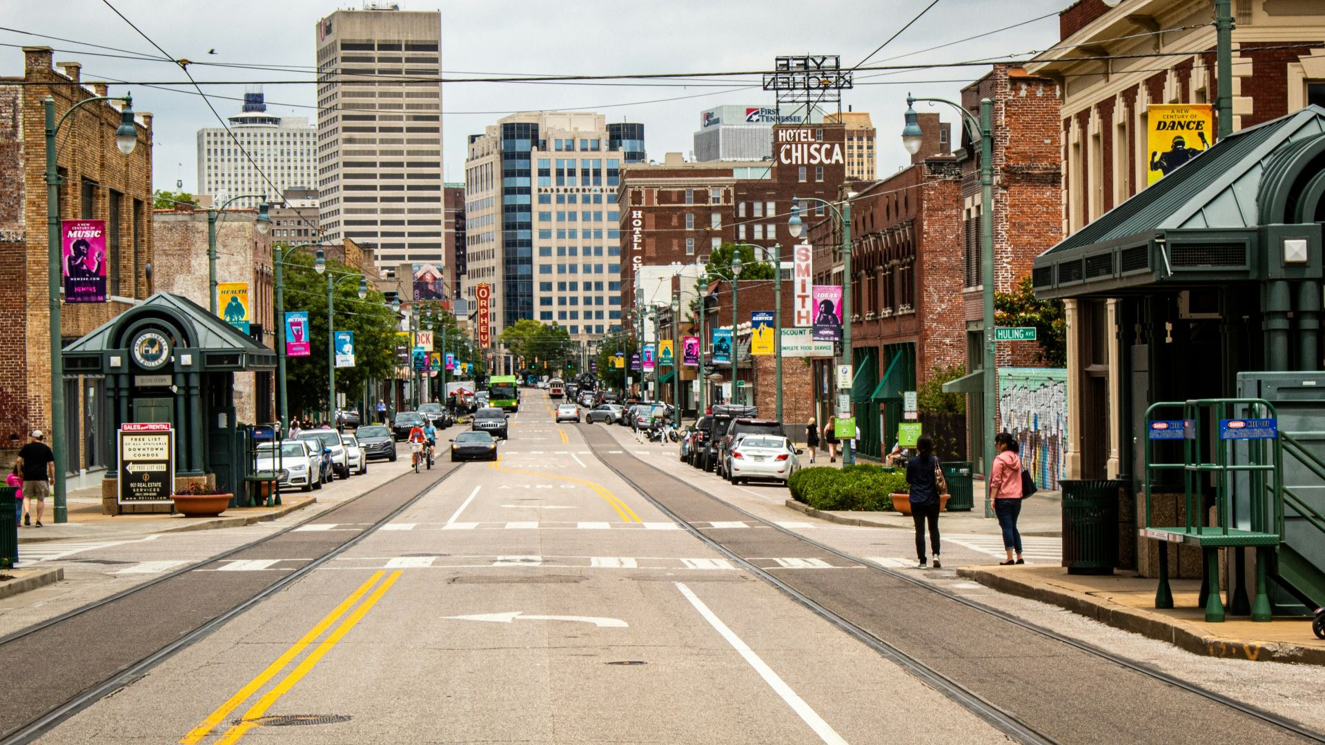 two women standing in corner of street