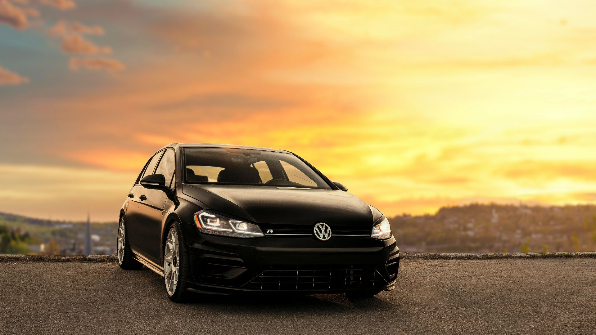 black mercedes benz c class on gray asphalt road during sunset