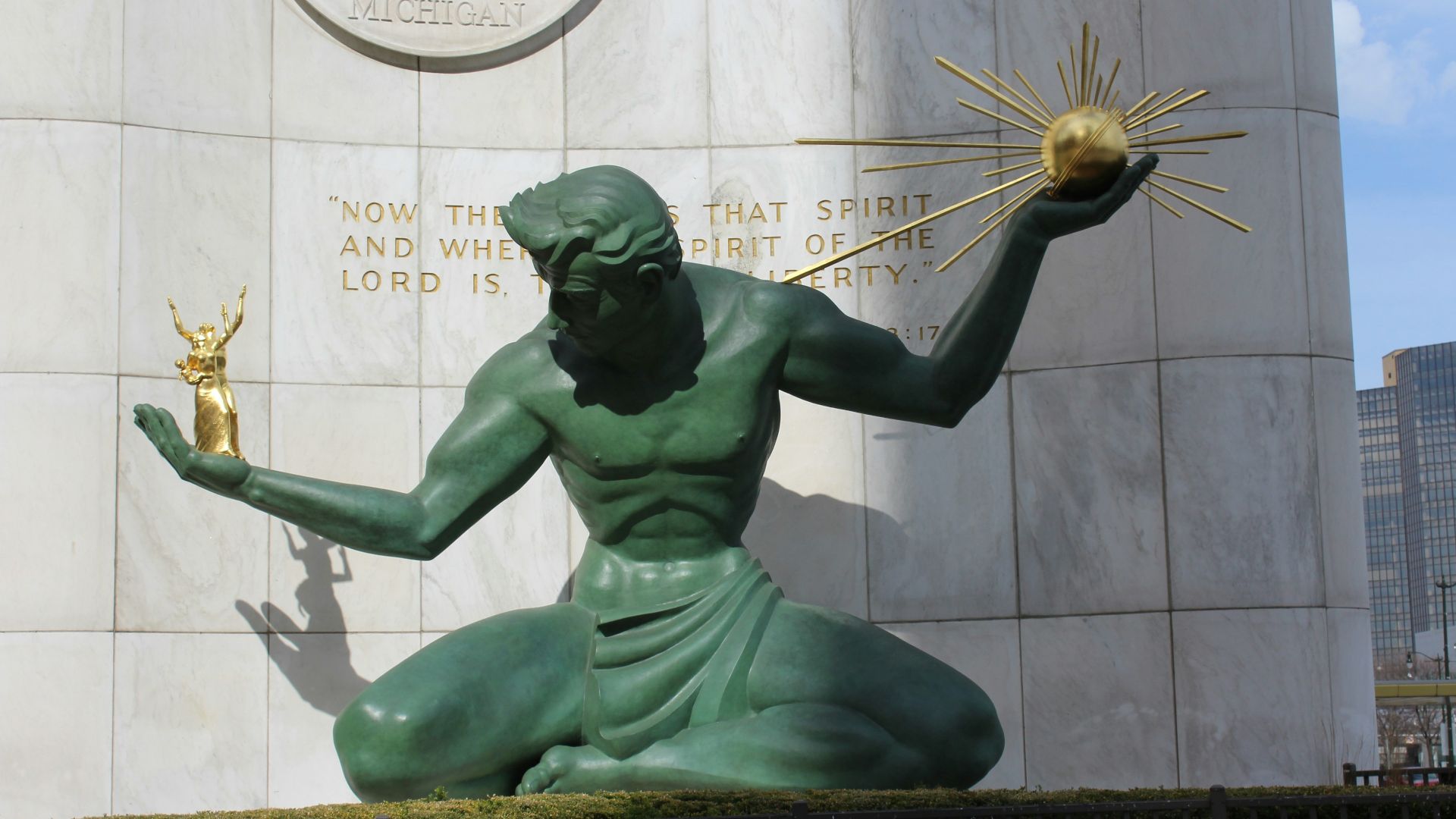 green statue of a man