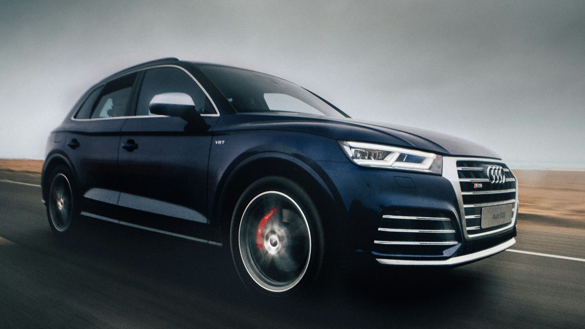 black Audi Q7 SUV on road