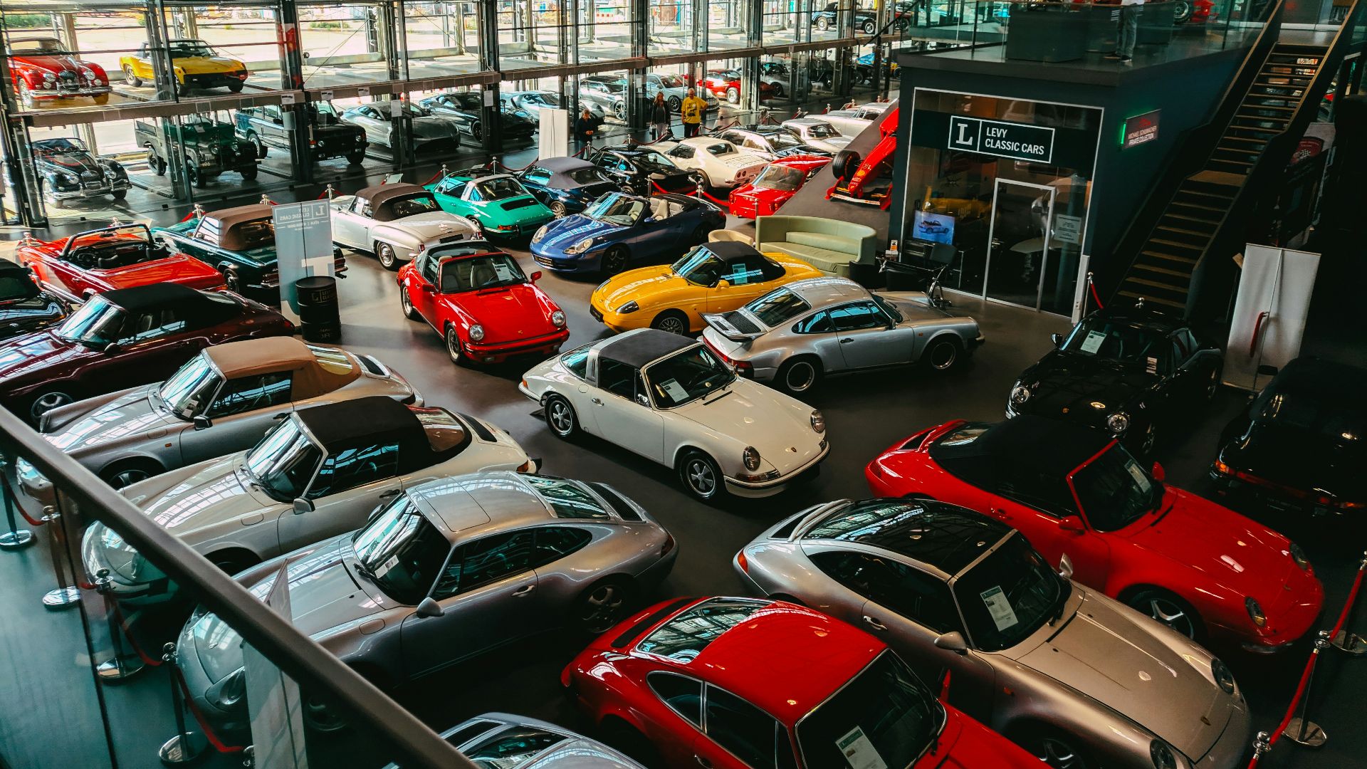 cars parked in front of building during daytime
