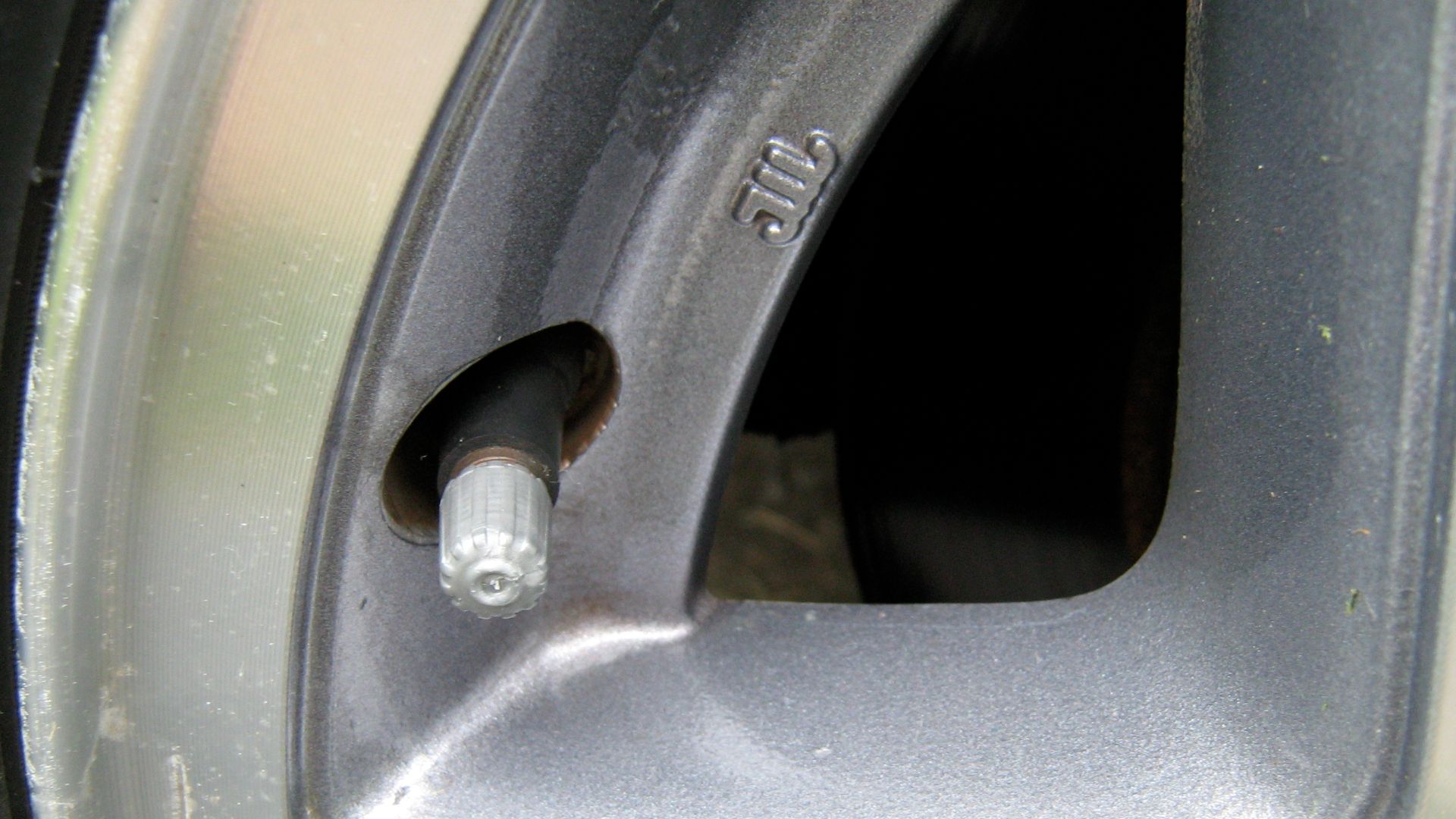 File:Tire valve stem-cap on.jpg