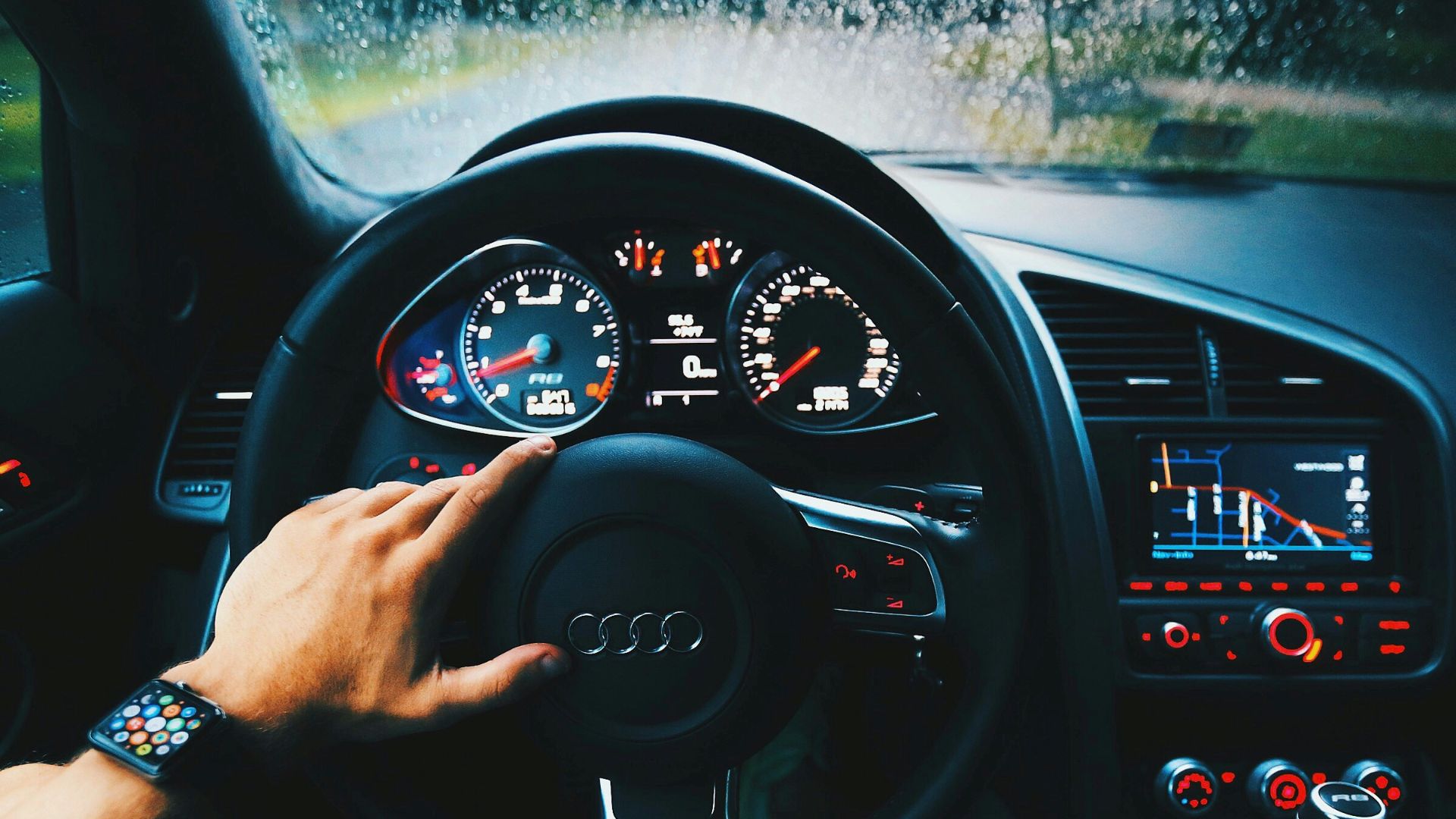 black Audi vehicle steering wheel