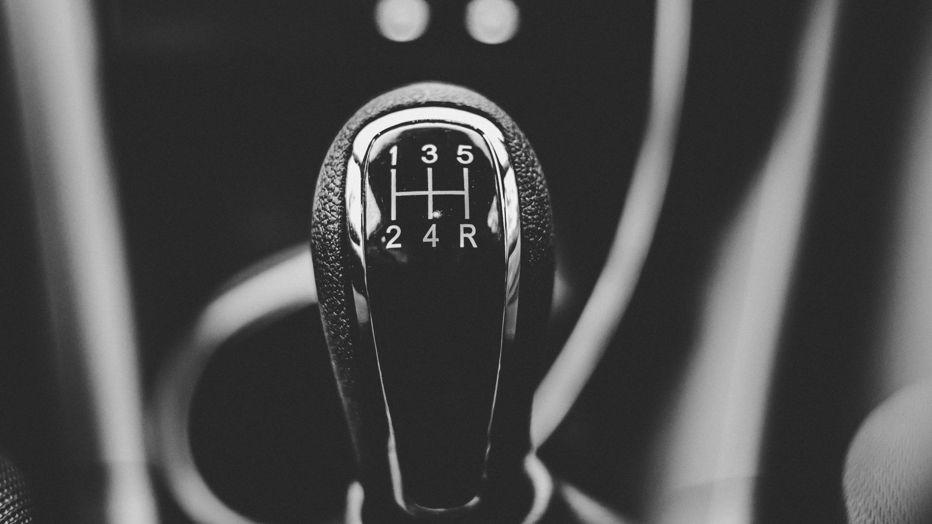 focus photography of car shift gear