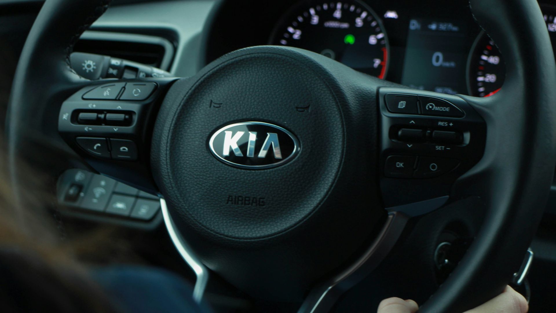 black and gray mercedes benz steering wheel