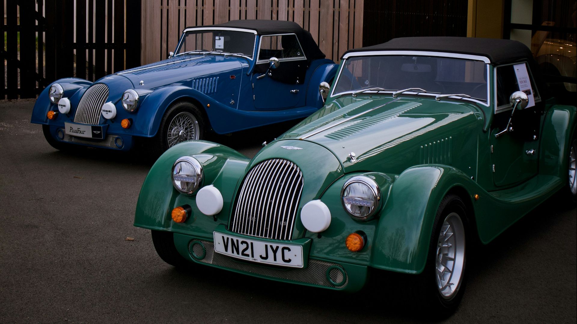 a couple of cars parked next to each other