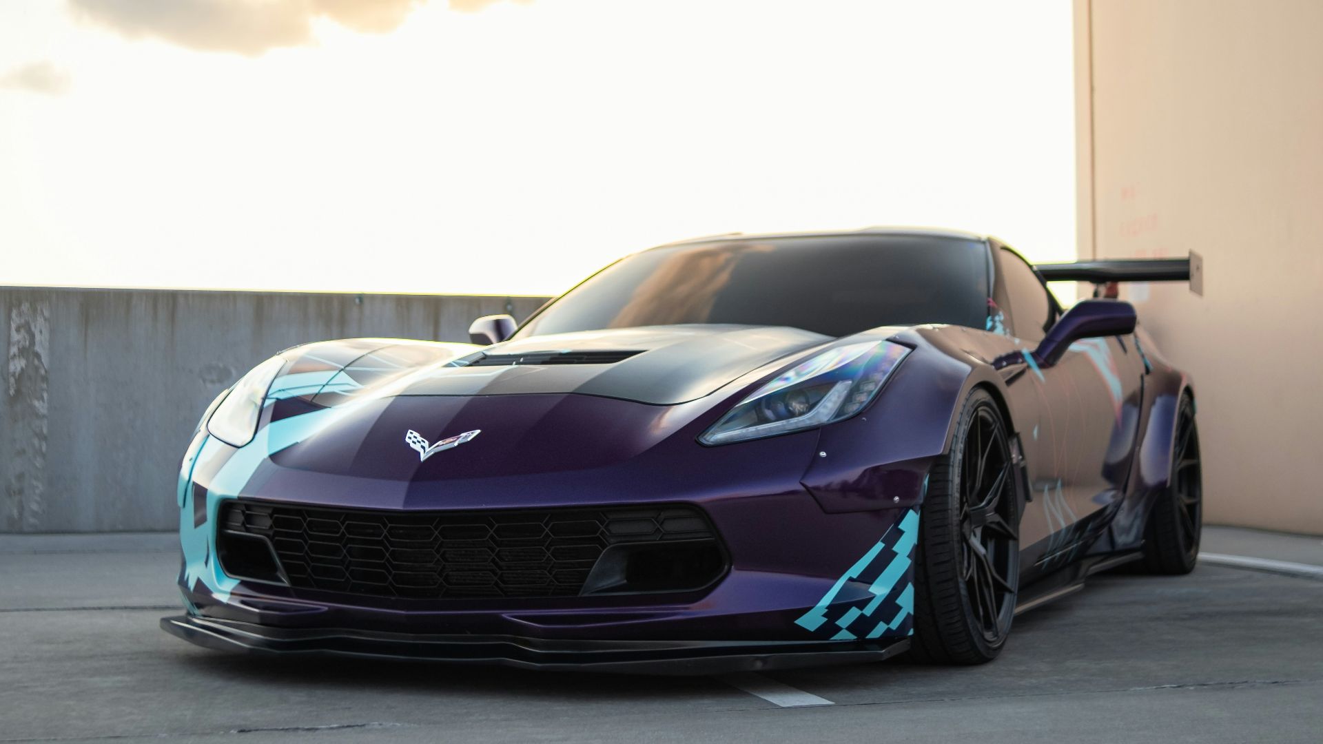 blue and black porsche 911 on road