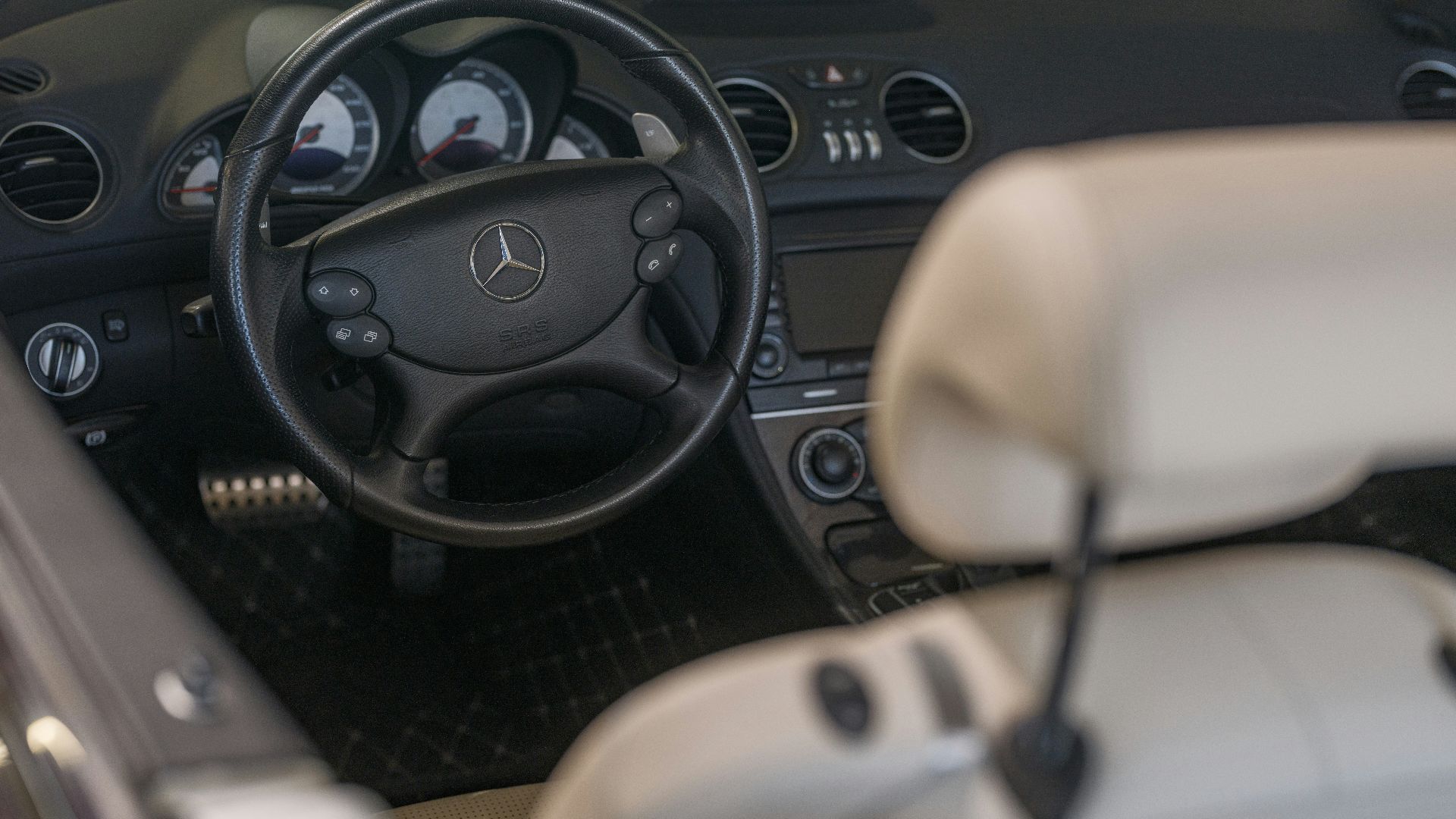 The interior of a mercedes-benz car is shown.