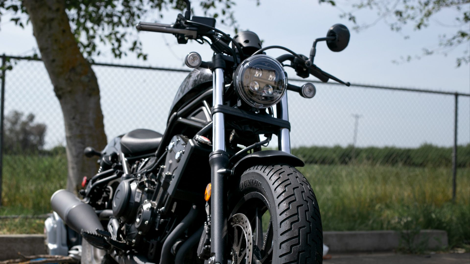 a motorcycle parked on the side of a road