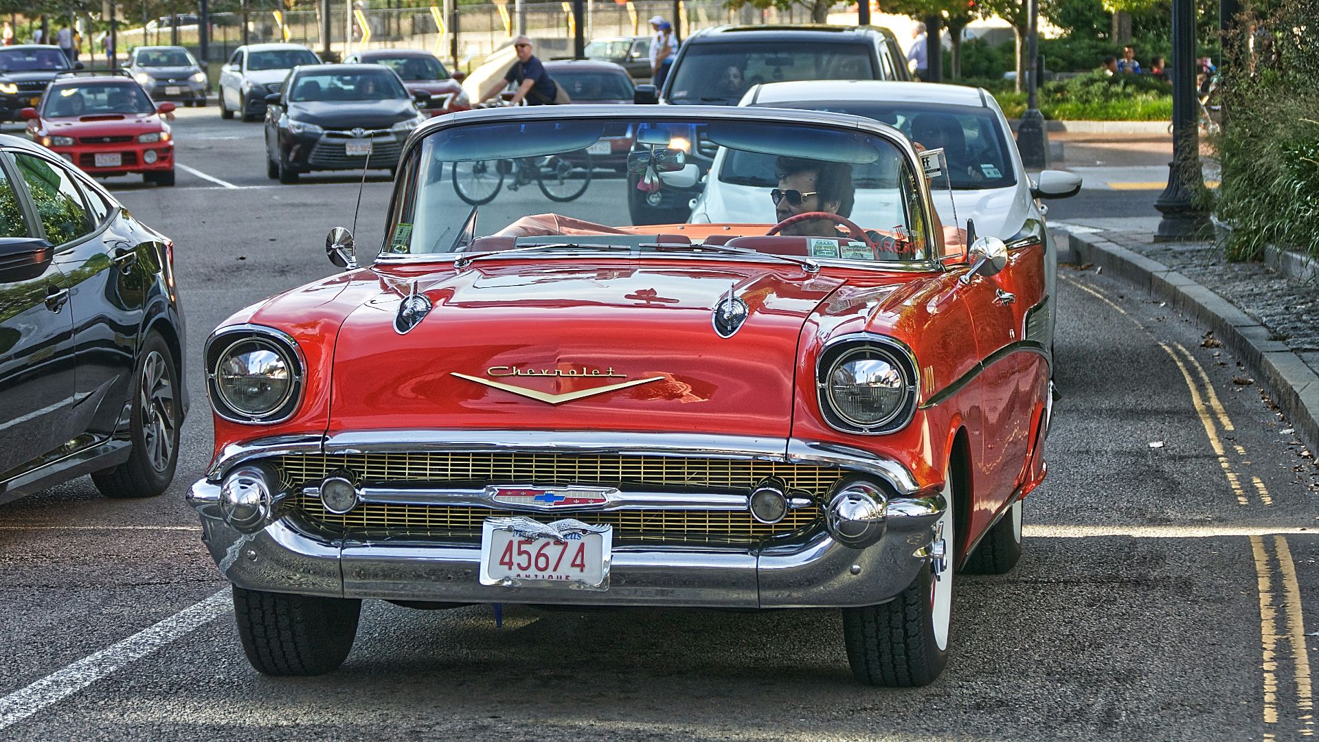 red chevrolet car on road during daytime