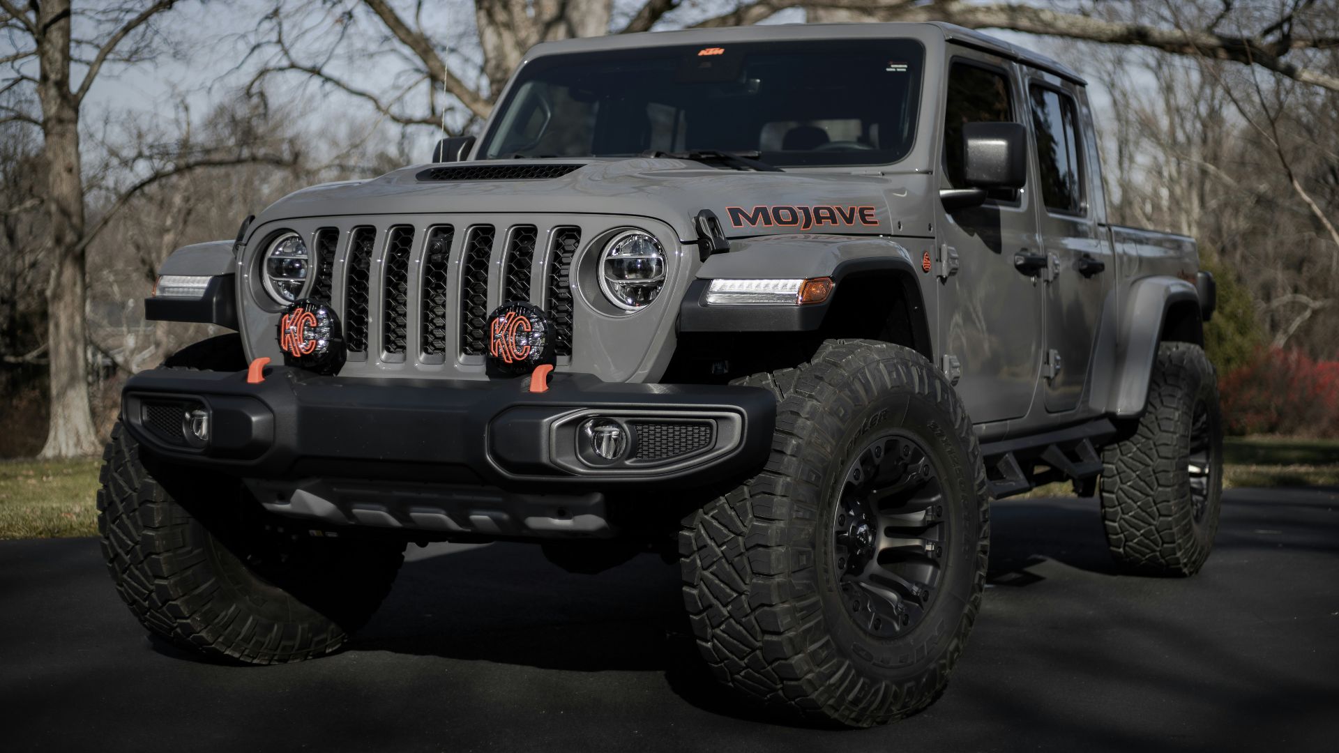 black and gray jeep wrangler on snow covered ground