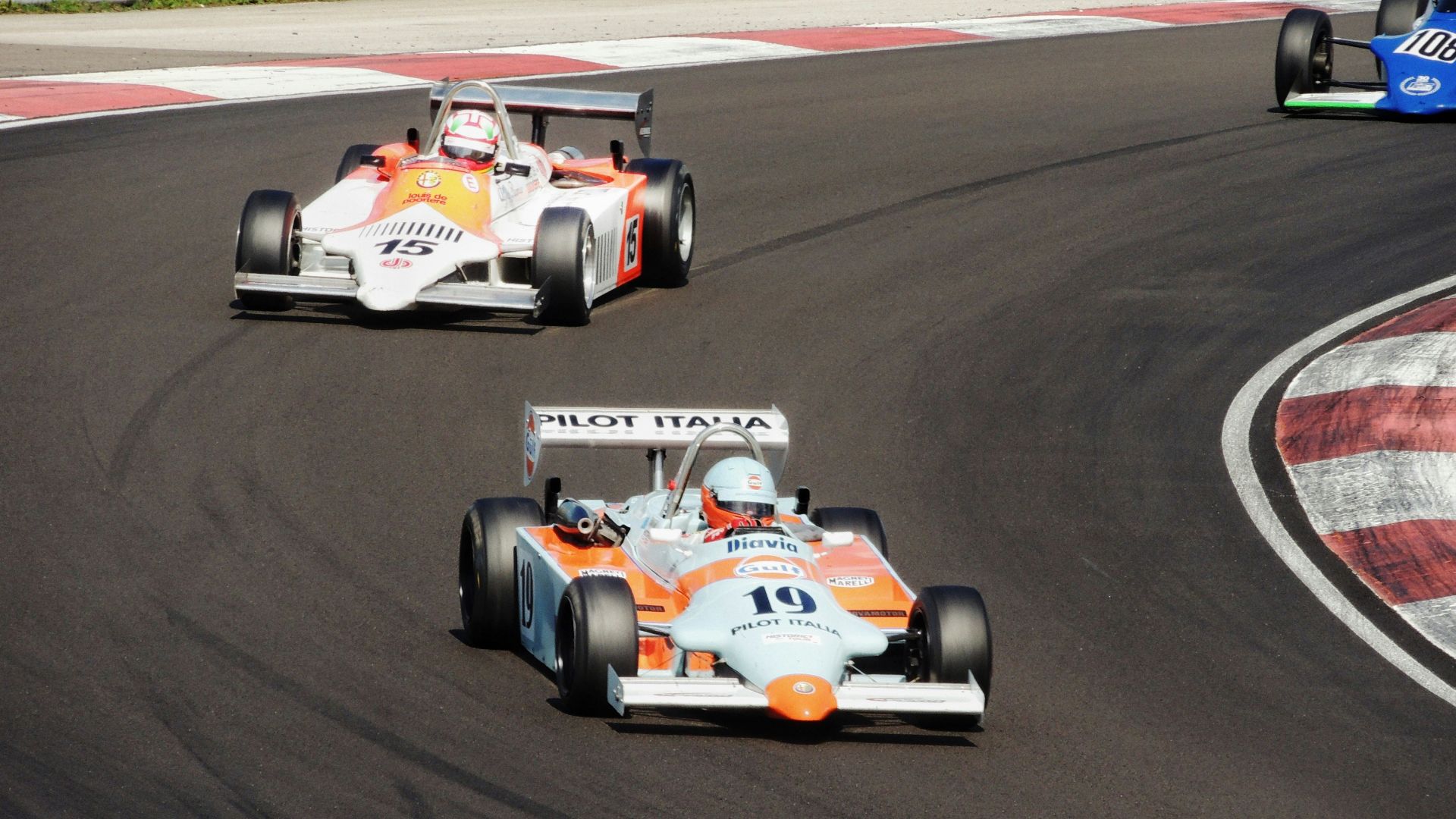 race cars on a track