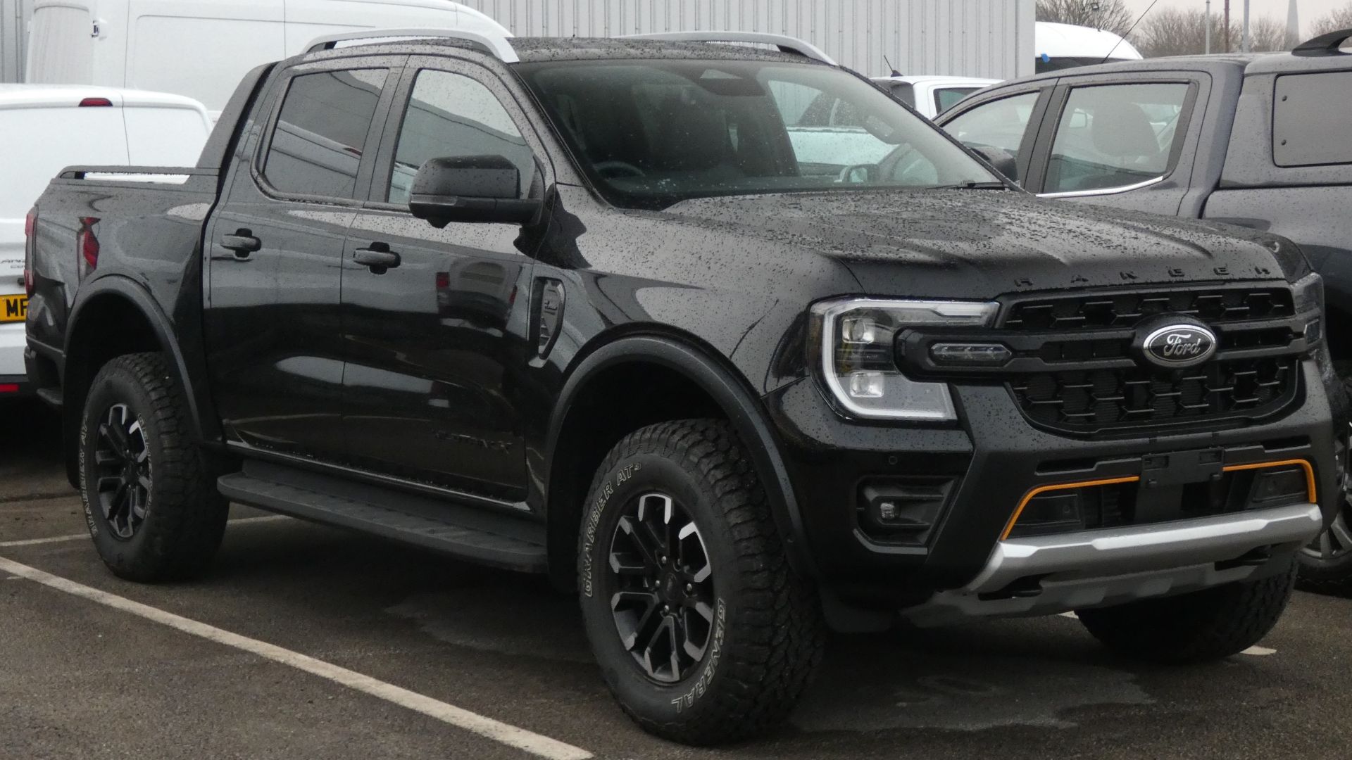 File:2025 Ford Ranger Wildtrak X EcoBlue 4x4 - 1996cc 2.0 (205PS) Diesel - Agate Black - 02-2025, Front.jpg
