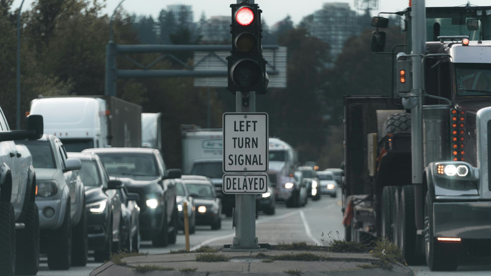 a traffic light on a busy city street