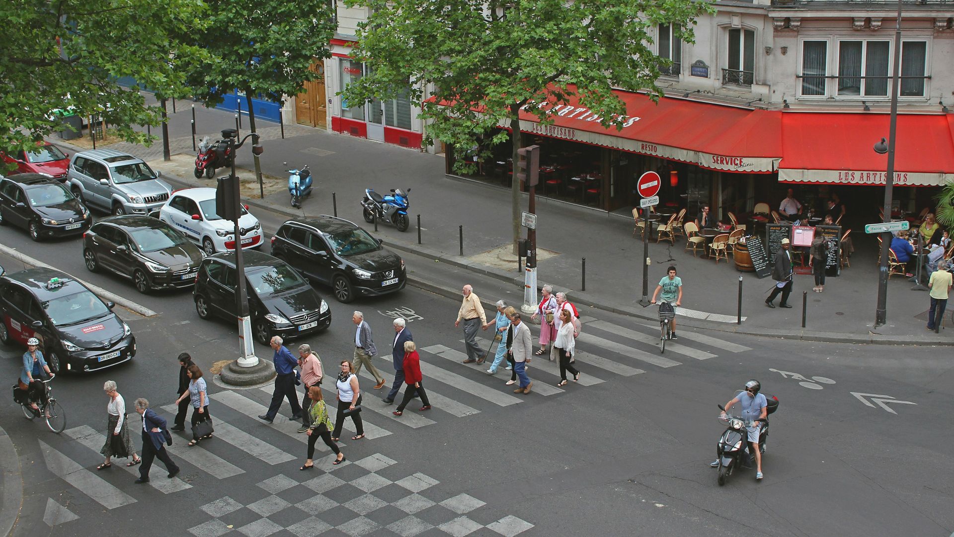 people walking on pedestrian lane