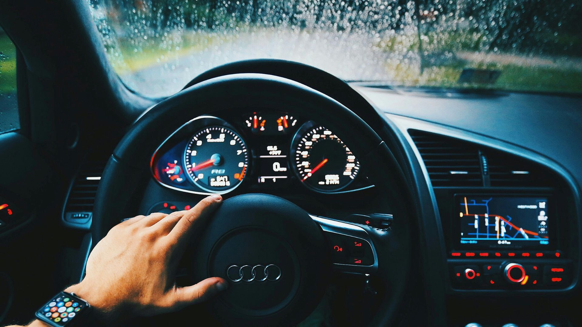 black Audi vehicle steering wheel