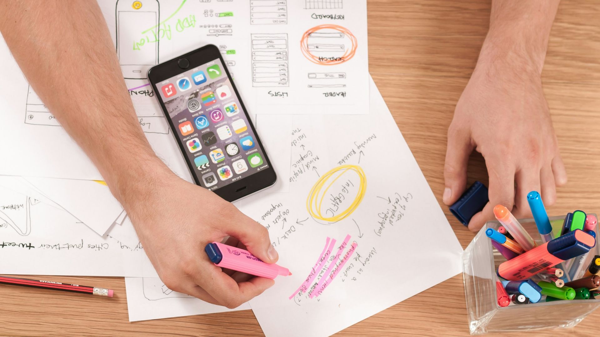 person writing on white paper