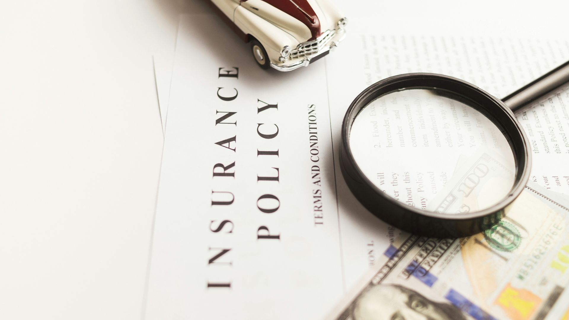a magnifying glass sitting on top of a piece of paper