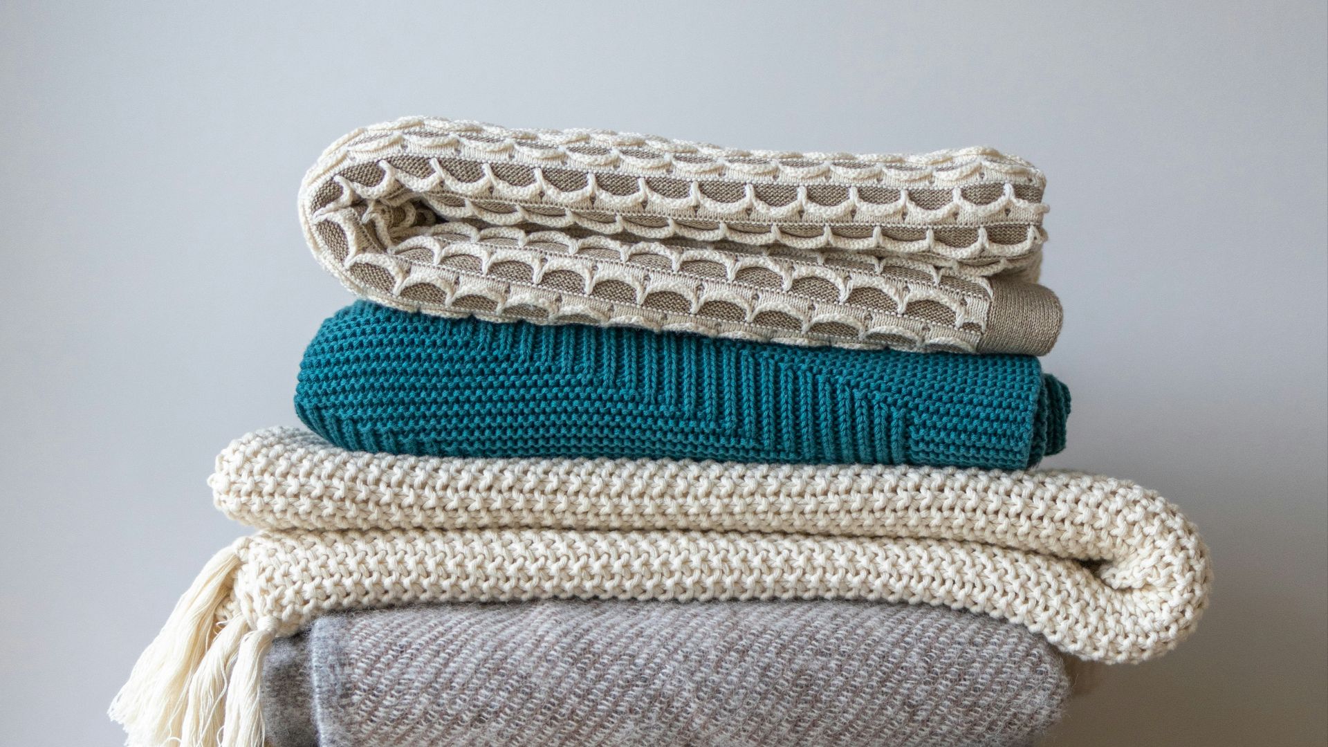 white and blue knit textile